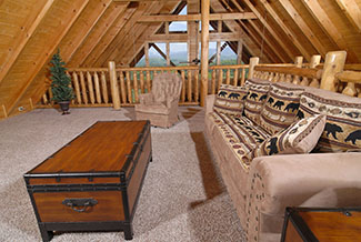 Pigeon Forge Four Bedroom Cabin with a lofted area that has a mountain view